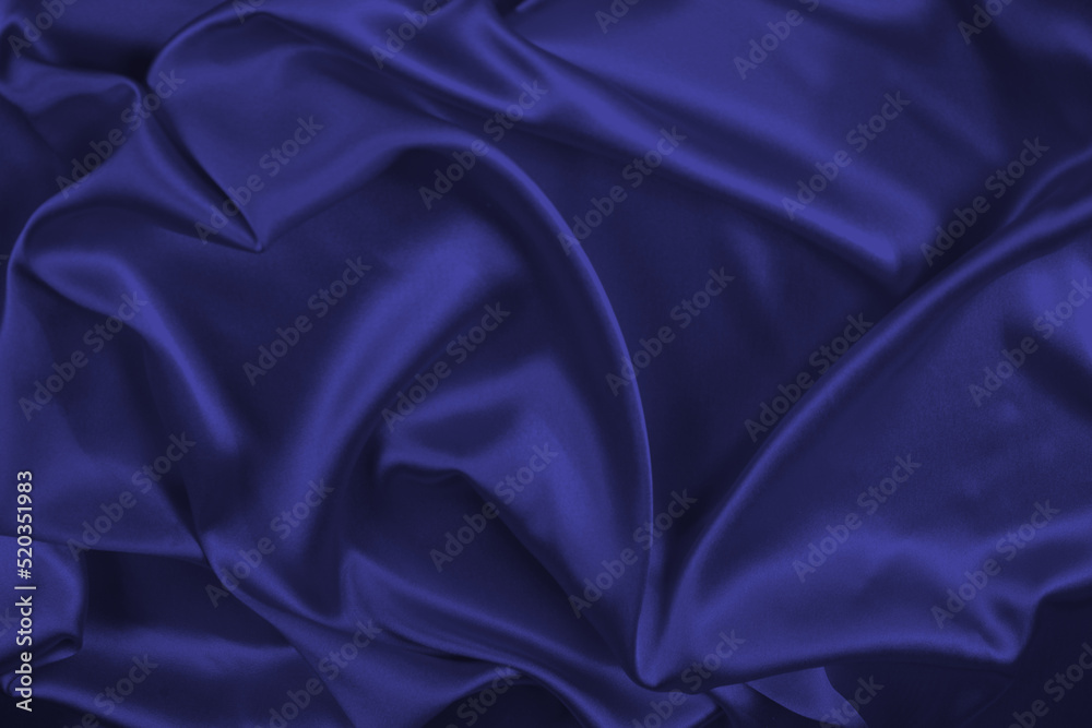 Fototapeta premium Red silk or satin luxury fabric texture can use as abstract background. Top view.