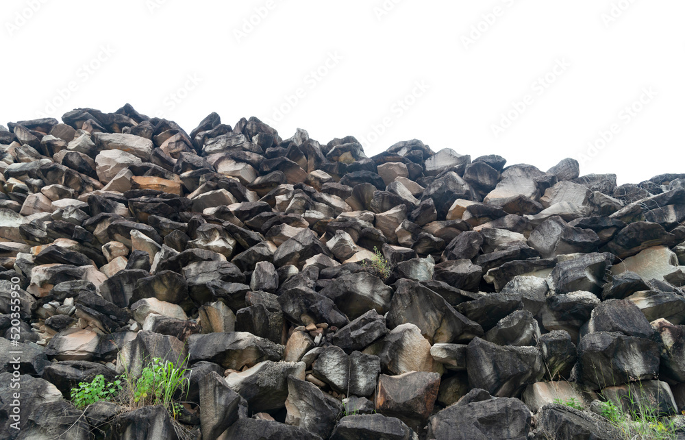 Piles of gravel limestone rock on construction site, isolated on white background with clipping path.