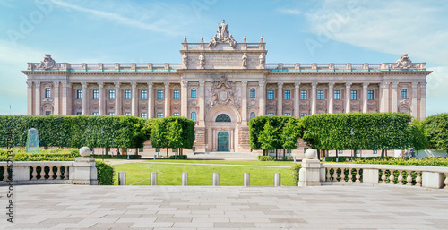 Facade of Riksdagshuset, the Swedish Parliament House, located on the island of Helgeandsholmen, Old town, or Gamla Stan, Stockholm, Sweden, in a summer day photo