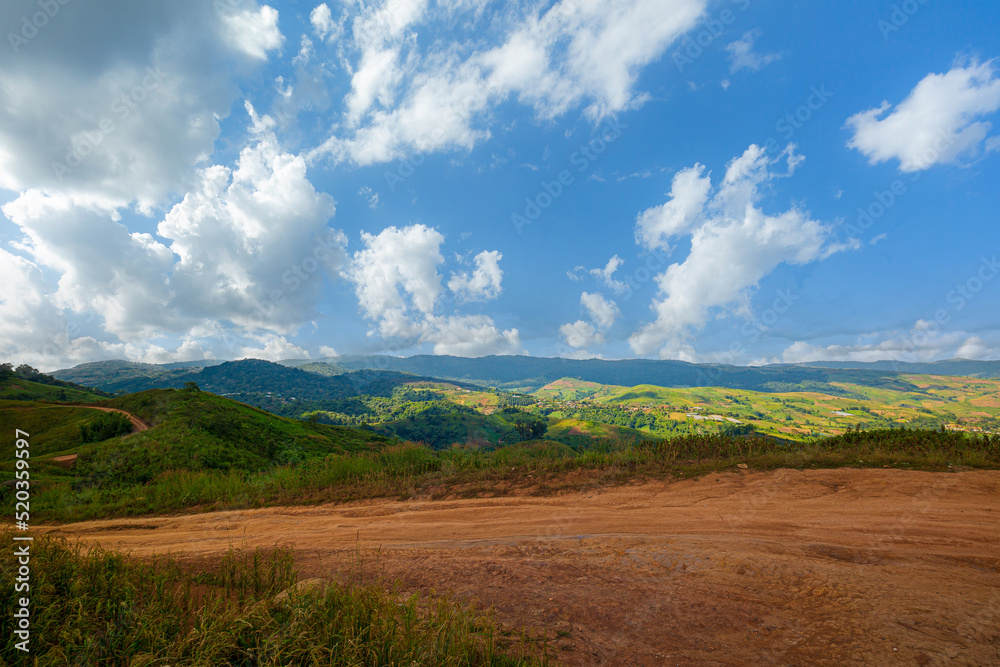 Rural roads and mountains in Asia,panoramic view of the mountains and the beautiful sky,Panoramic view of colorful sunrise in mountains.