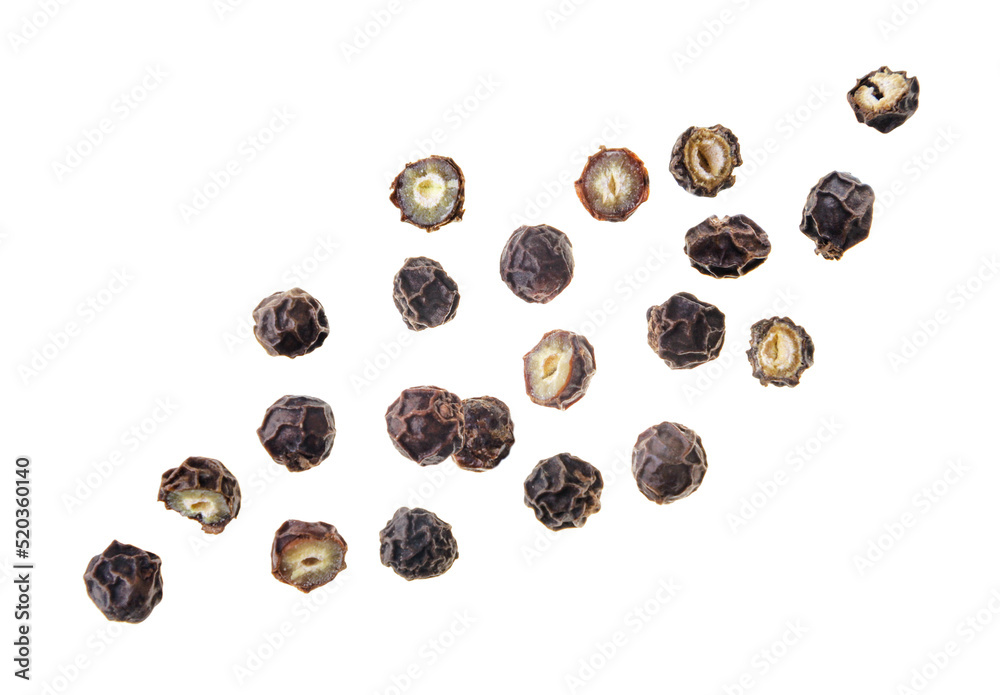 Peppercorns and halves flies on a white background. Isolated Peppercorns and halves flies on a white background. Isolated