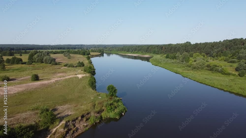 Rising over deserted Bug river with no one on horizon Rising over deserted Bug river with no one on horizon