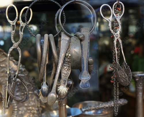 Beautiful silver antique things in the flea market display