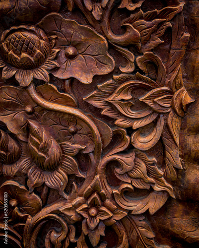фотографія Details of a fine carving art on wooden door