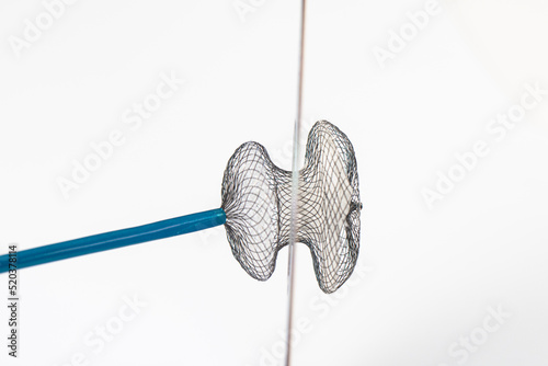 Atrial Septal Defekt. Devices for invasive cardiology procedures. Device for atrial septal defect closure on a white background.
