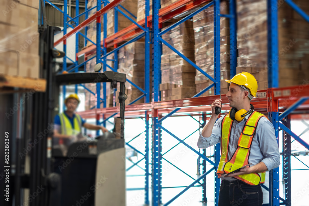 worker person working with safety in warehouse logistic factory, business manufacturing industry occupation concept, goods product box distribution. Storehouse employee in uniform. warehouse worker.