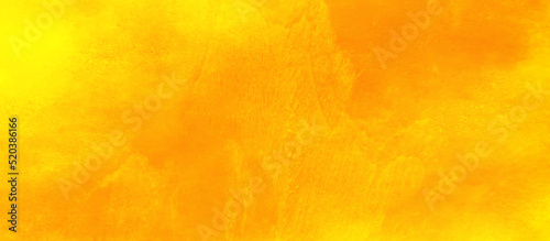 Abstract decorative and bright orange or yellow background with paint, bright and shinny yellow or orange watercolor shades grunge background with space, yellow or orange background for any design.