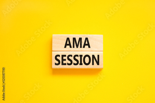 AMA ask me anything session symbol. Concept words AMA ask me anything session on wooden blocks on a beautiful yellow background. Business and AMA ask me anything session concept. Copy space.