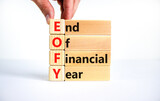 EOFY end of financial year symbol. Concept words EOFY end of financial year on blocks on beautiful white background. Business and EOFY end of financial year concept.