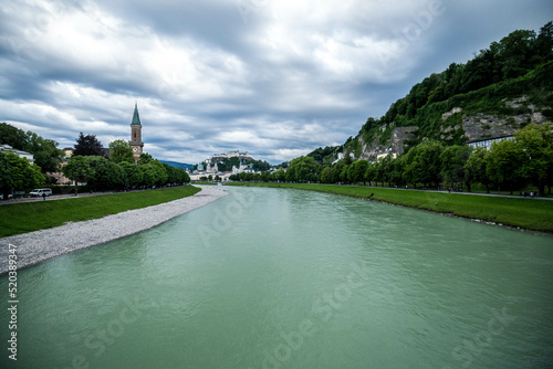 Salzburg skyline with river Salzach, Salzburger Land, Austria, cloudy day photo