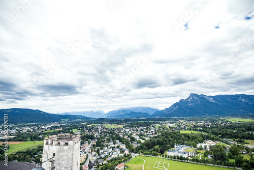 Beautiful of Aerial panoramic view in a Autumn season at a historic city of Salzburg with Salzach river in beautiful golden evening light sky and colorful of autumn at sunset, Salzburger Land, Austria photo