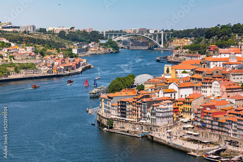 Panoramic view of the center of Porto as well as the Douro riverbank and the Ponte da Arrabida, Portugal photo