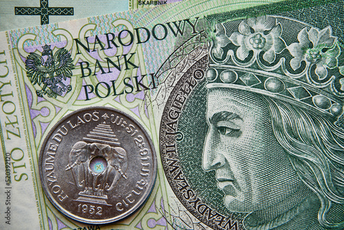 polski banknot,100 PLN, kip laotański ,moneta ,Laos , Polish banknote, 100 PLN, Laotian kip, coin, Laos