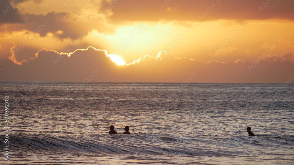 Sunset surfing in Maui Hawaii 8