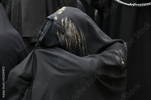 turkey muslim women and children chaining themselves at KERBELA mourning ceremony in Istanbul.Hz. Hussein Karbala memorial ceremony photo