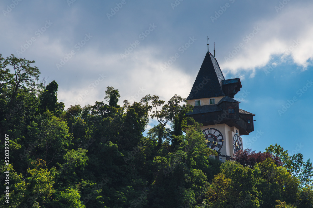 Uhrturm Graz in summer, Landmark of the capitol city of Styria, Austria Uhrturm Graz in summer, Landmark of the capitol city of Styria, Austria