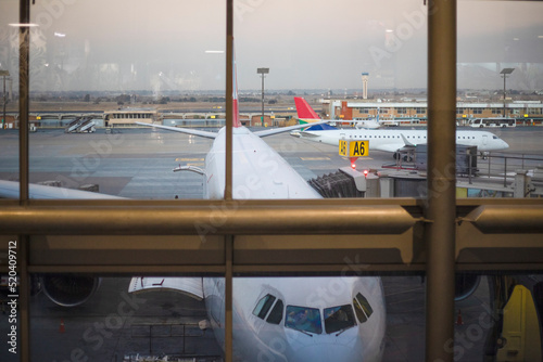 Jet aircraft at the boarding gate of Johannesburg International Airport in South Africa, the best airport in the African continent.