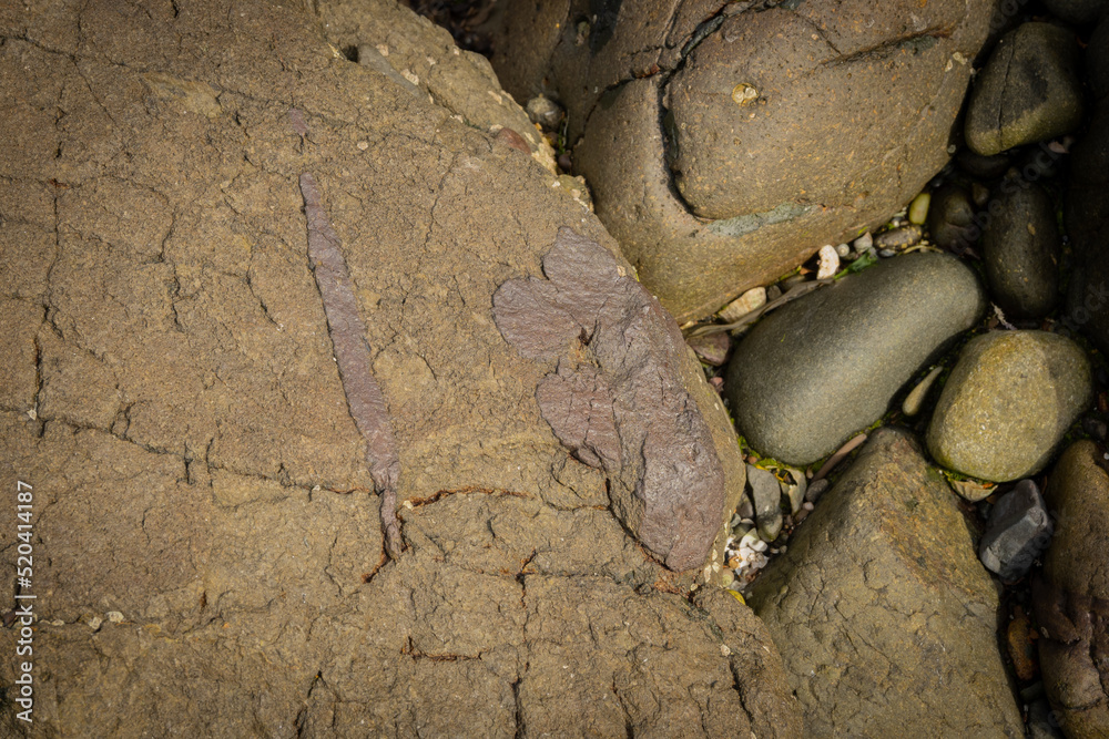 traces of iron ore can be seen in this rock in its rawest and most