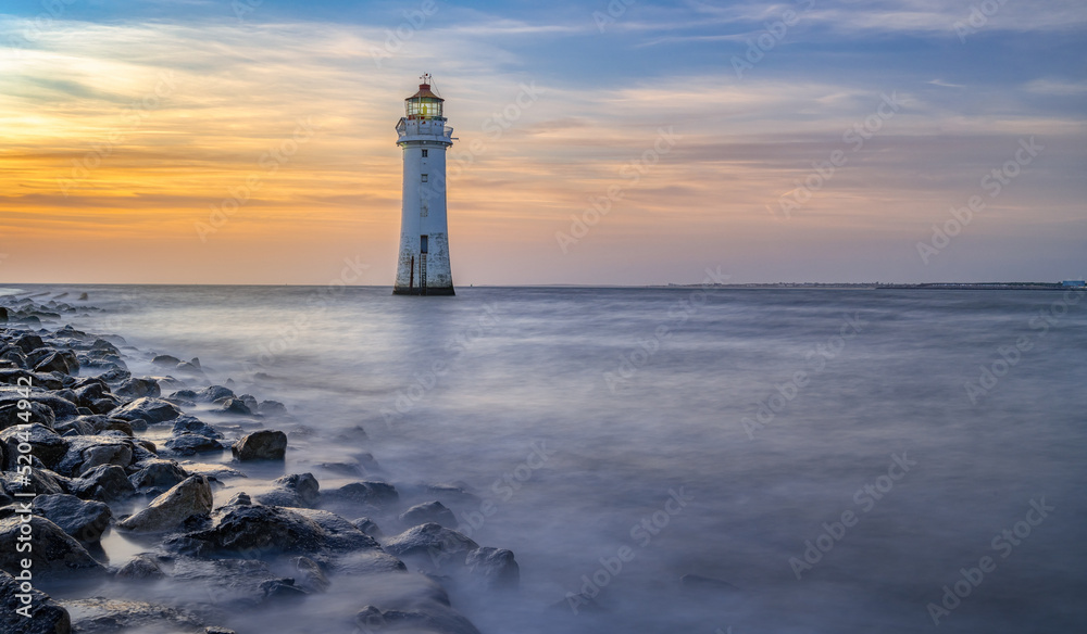 New Brighton Lighthouse in yellow sunset