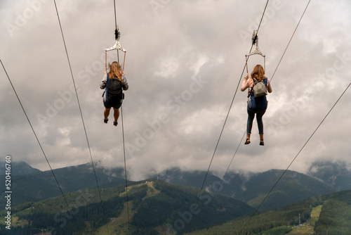 Descent on a zipline in the mountains