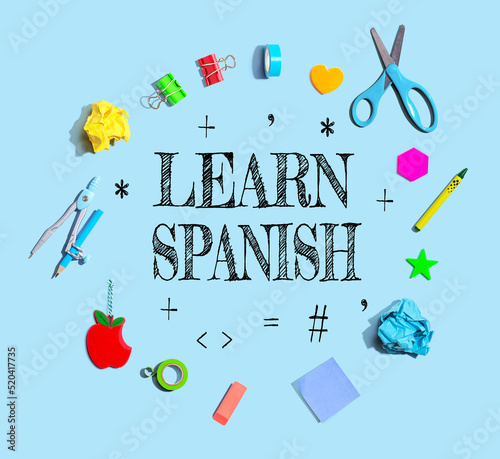 Learn Spanish theme with school supplies overhead view - flat lay photo