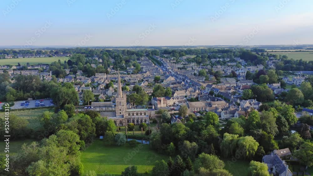 Aerial Drone View of Cotswolds Village and Burford Church in England, a Popular English Picturesque Tourist Destination in the Countryside of Gloucestershire Aerial Drone View of Cotswolds Village and Burford Church in England, a Popular English Picturesque Tourist Destination in the Countryside of Gloucestershire