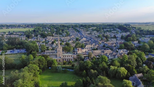 Aerial Drone View of Cotswolds Village and Burford Church in England, a Popular English Picturesque Tourist Destination in the Countryside of Gloucestershire photo