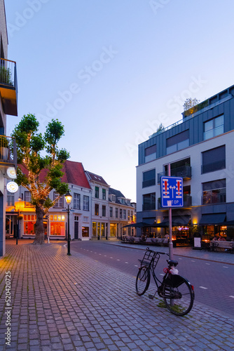 Cityscape small northern european city. Stone street with old houses and buildings. Breda, Netherlands