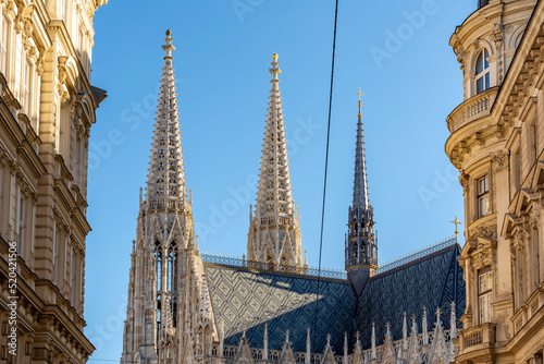 Towers of Votivkirche church in Vienna, Austria photo