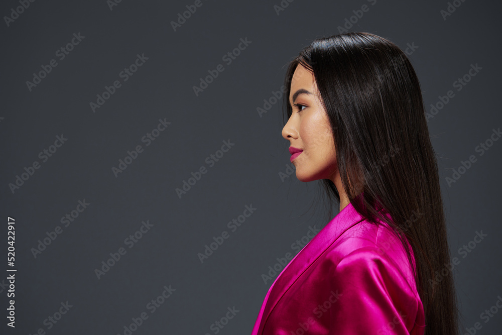 pretty woman bright makeup pink mini dress modern style Gray background pretty woman bright makeup pink mini dress modern style Gray background