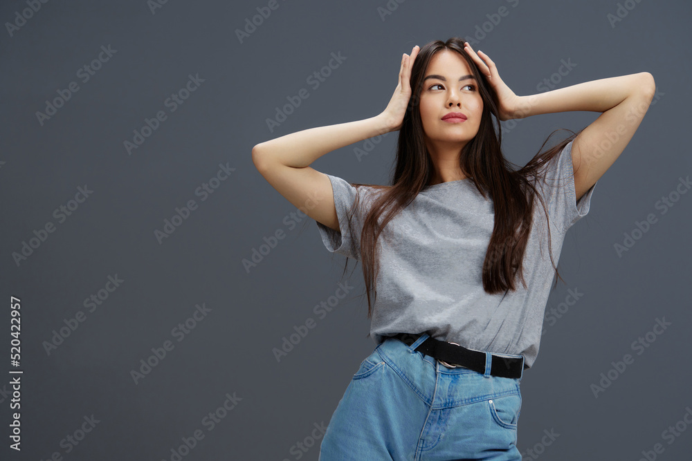 woman in a t-shirt and jeans posing Youth style isolated background