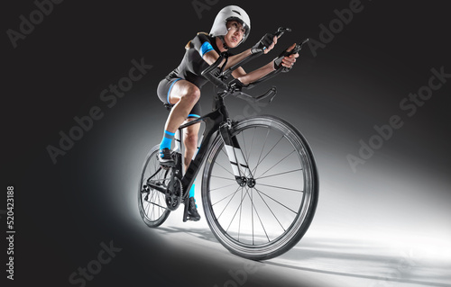 Fototapeta Naklejka Na Ścianę i Meble -  Athlete cyclists in silhouettes on white background. Isolated on black.