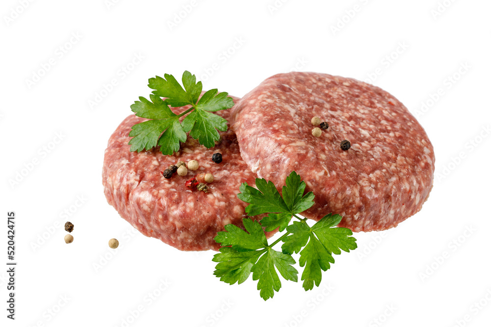 Two raw beef cutlet patty of minced meat for burger or dinner dish with parsley and pepper closeup flying isolated on white Two raw beef cutlet patty of minced meat for burger or dinner dish with parsley and pepper closeup flying isolated on white