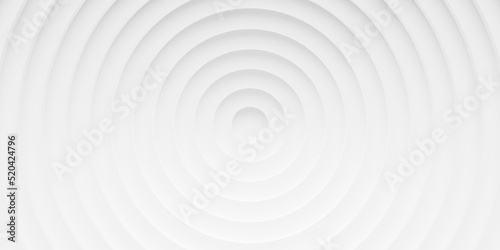 Concentric linear inset white rings or circles steps symmetrically lit from top background wallpaper banner flat lay top view from above © Shawn Hempel