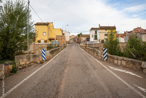a paved road entering Villanueva de Huerva, Campo de Cariñena, province of Zaragoza, Aragon, Spain photo