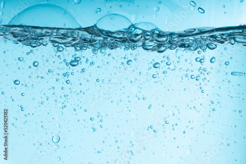 blue splash of water in a glass vessel