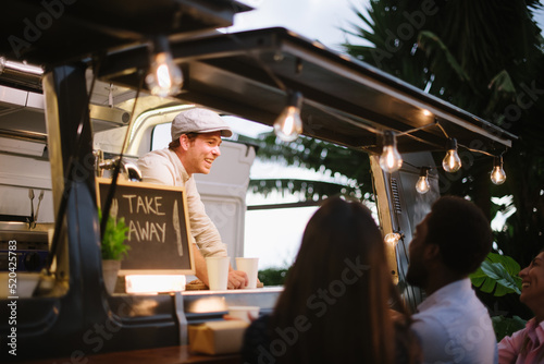 Happy vendor communicating with customers