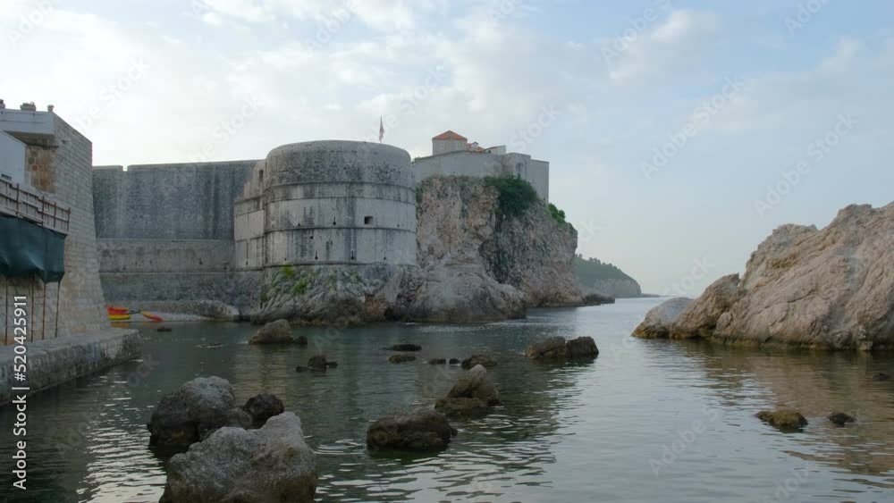 View from harbour on old town of Dubrovnik. Fort Bokar on sunrise on Adriatic sea, Dalmatia, Croatia, Europe. 4k video View from harbour on old town of Dubrovnik. Fort Bokar on sunrise on Adriatic sea, Dalmatia, Croatia, Europe. 4k video