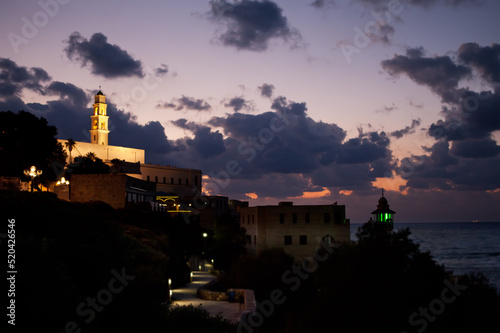 The coastline of the old city of Jaffa illuminated by lights at night