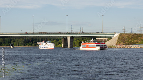 River navigation in Moscow: pleasure boats sail in the Khimki Canal - Severnoye Tushino - Moscow - Russia photo