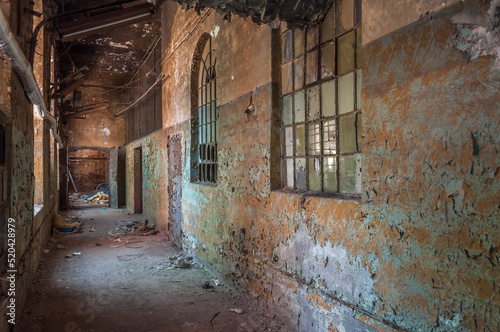 An abandoned old factory made of red bricks - a spinning mill in Poland