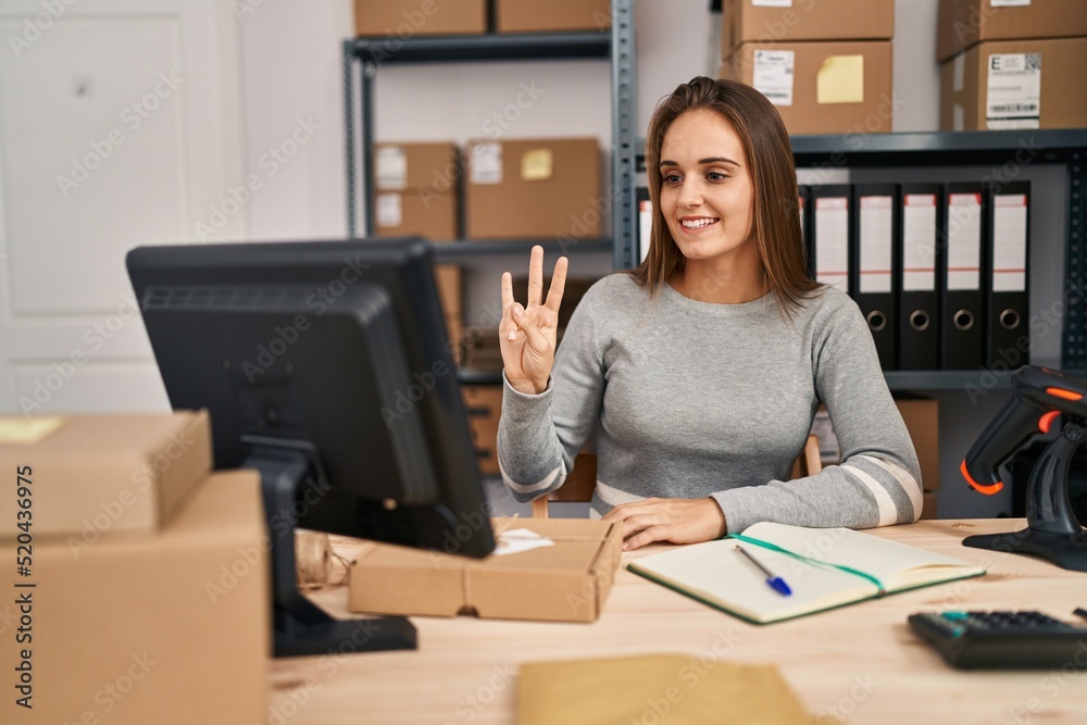 Young blonde woman ecommerce business worker having online deaf language conversation at office Young blonde woman ecommerce business worker having online deaf language conversation at office