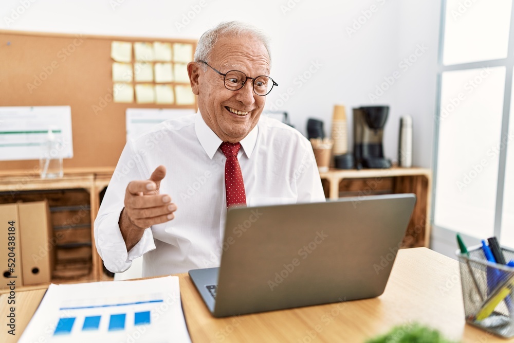 Senior man business worker having video call at office Senior man business worker having video call at office