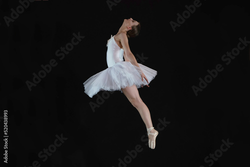 Fototapeta Naklejka Na Ścianę i Meble -  Ballet dancer in a dance jump