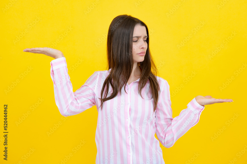 Woman point at copy space, showing copyspace pointing. Promo, girl showing advertisement content gesture, pointing with hand recommend product. Isolated background.