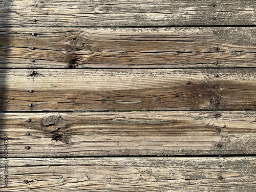 old wood fishing pier texture with nails