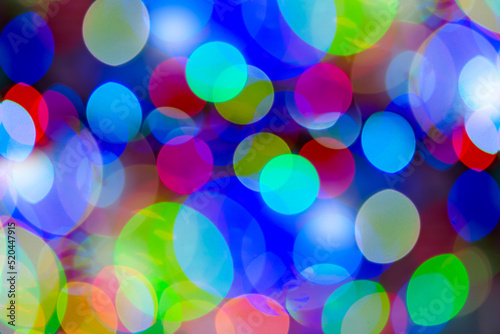 Blurred background with colorful bokeh lights. Background blurred Christmas lights