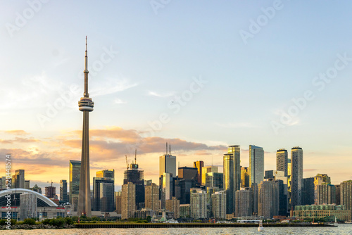 Downtown Toronto skyline with CN Tower and skyscrapers at sunset