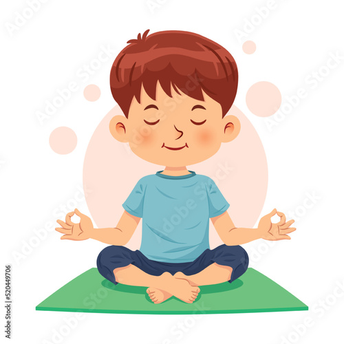 Cute boy sitting cross-legged and meditating in yoga pose, calm and relaxed