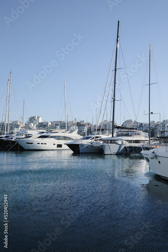 Picturesque view of port with modern boats on sunny day